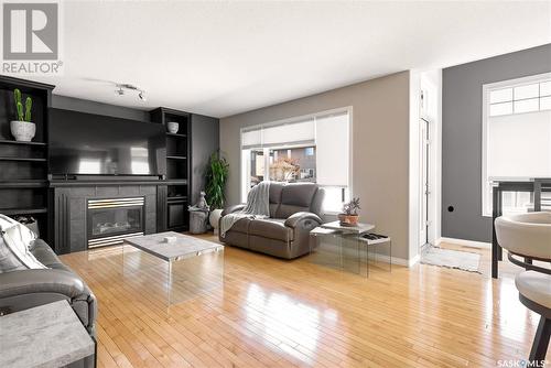 7806 Sparrow Street, Regina, SK - Indoor Photo Showing Living Room With Fireplace