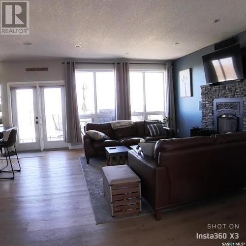 20 Rosewood Drive, Lumsden, SK - Indoor Photo Showing Living Room With Fireplace