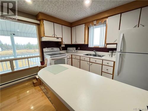 9054 17 Route, Whites Brook, NB - Indoor Photo Showing Kitchen With Double Sink