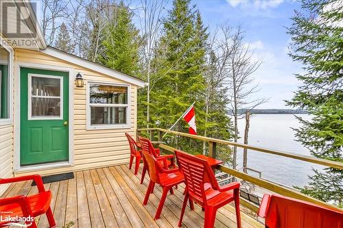 1024 Marys Lane, Algonquin Highlands, ON - Outdoor With Body Of Water With Deck Patio Veranda With Exterior