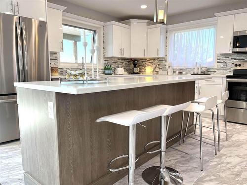 Rainy River, ON - Indoor Photo Showing Kitchen With Upgraded Kitchen
