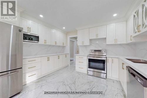 710 Morrish Rd, Toronto, ON - Indoor Photo Showing Kitchen With Double Sink
