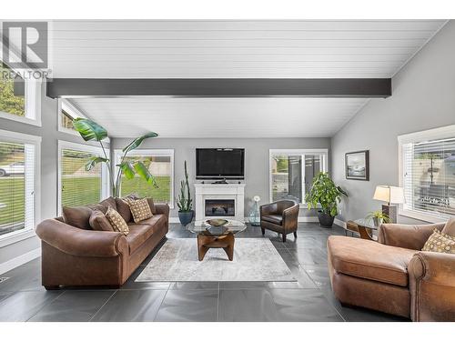 1047 Cascade Place, Kelowna, BC - Indoor Photo Showing Living Room With Fireplace
