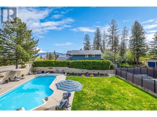 1047 Cascade Place, Kelowna, BC - Outdoor With In Ground Pool With Backyard