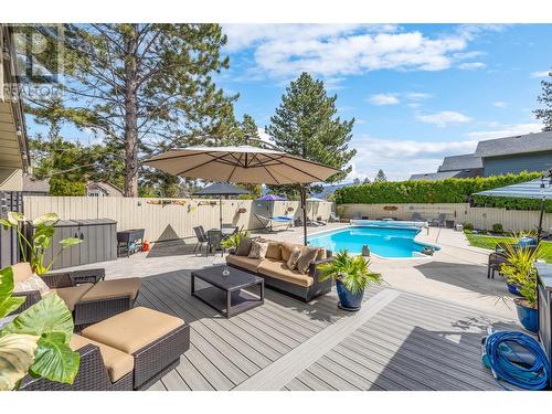 1047 Cascade Place, Kelowna, BC - Outdoor With In Ground Pool With Deck Patio Veranda With Backyard