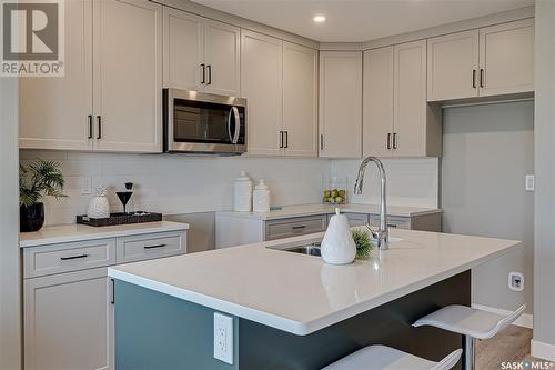 166 Kostiuk Crescent, Saskatoon, SK - Indoor Photo Showing Kitchen With Upgraded Kitchen