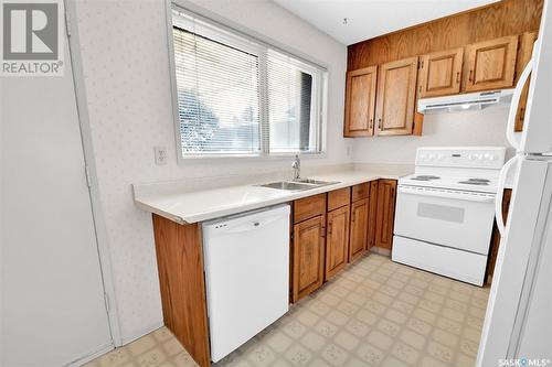 10 303 Saguenay Drive, Saskatoon, SK - Indoor Photo Showing Kitchen With Double Sink
