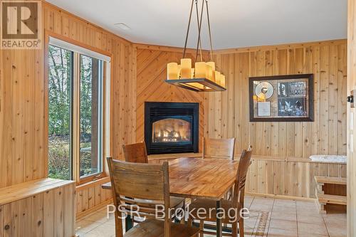 1824 Kilworthy Road, Gravenhurst, ON - Indoor Photo Showing Dining Room With Fireplace