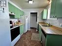 415 Bergeron Drive, Tumbler Ridge, BC  - Indoor Photo Showing Kitchen With Double Sink 