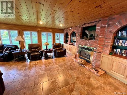 72 Young Lane, Oak Haven, NB - Indoor Photo Showing Living Room With Fireplace