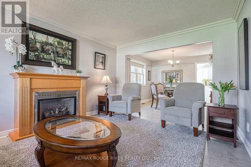 1041 Glenhare St, Cobourg, ON - Indoor Photo Showing Living Room With Fireplace