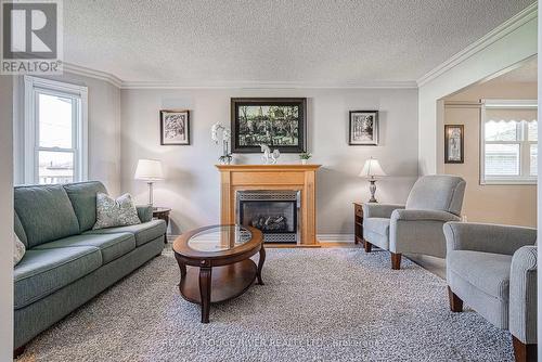 1041 Glenhare St, Cobourg, ON - Indoor Photo Showing Living Room With Fireplace