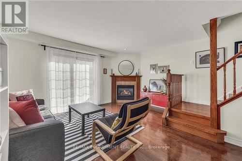#13 -437 Highway 8, Hamilton, ON - Indoor Photo Showing Living Room With Fireplace