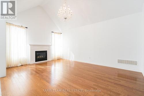 140 Copeland Cres, Innisfil, ON - Indoor Photo Showing Other Room With Fireplace