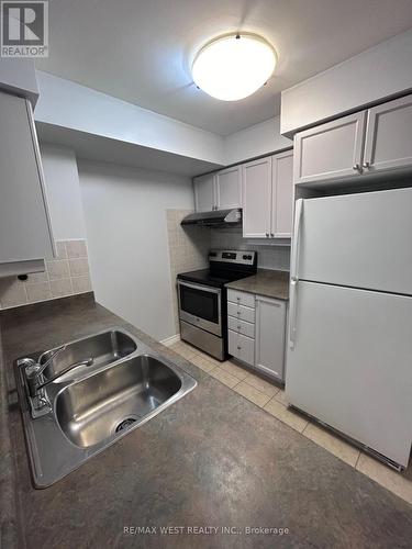 #208 -710 Humberwood Blvd, Toronto, ON - Indoor Photo Showing Kitchen With Double Sink
