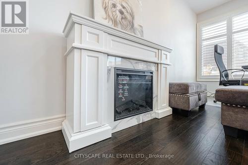 12 Gruenwald Gate E, Brampton, ON - Indoor Photo Showing Living Room With Fireplace