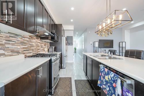 12 Gruenwald Gate E, Brampton, ON - Indoor Photo Showing Kitchen With Double Sink With Upgraded Kitchen
