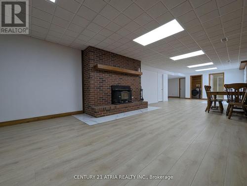 Lower - 448 Davis Drive, Uxbridge, ON - Indoor With Fireplace