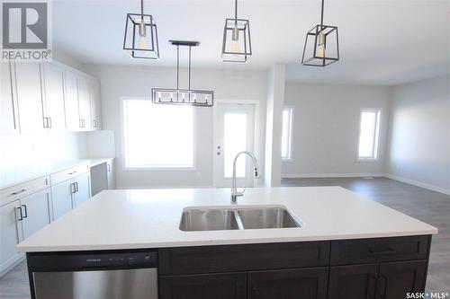 130 Kostiuk Crescent, Saskatoon, SK - Indoor Photo Showing Kitchen With Double Sink