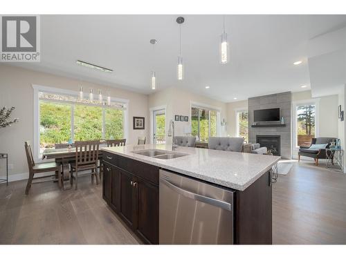 3119 Riesling Way, West Kelowna, BC - Indoor Photo Showing Kitchen With Fireplace With Double Sink