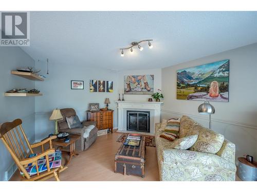166 Heather Place, Penticton, BC - Indoor With Fireplace