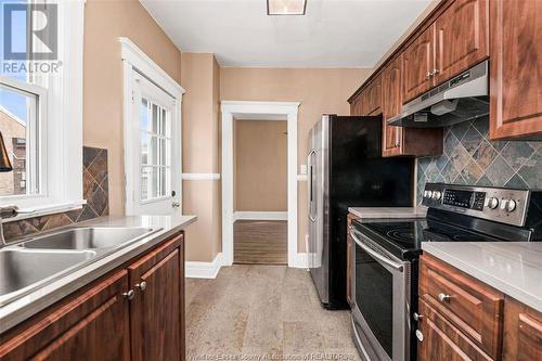 1290 Chilver, Windsor, ON - Indoor Photo Showing Kitchen With Double Sink