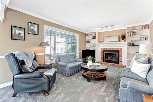 Lots of room in here. Gas fireplace. - 501 Winona Road, Stoney Creek, ON - Indoor Photo Showing Living Room With Fireplace
