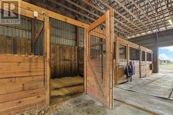 Indoor arena/barn with 15 box stalls - 