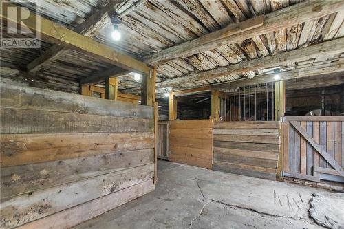 Log barn with 6 box stalls perfect for small livestock - 1461 Goshen Road, Renfrew, ON - 