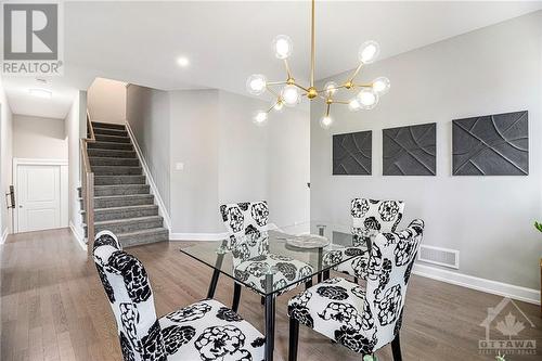 Upgraded light fixtures throughout the home - 348 Ventoux Avenue, Ottawa, ON - Indoor Photo Showing Dining Room