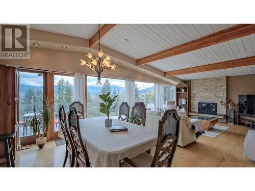 404 West Bench Drive, Penticton, BC - Indoor Photo Showing Dining Room With Fireplace
