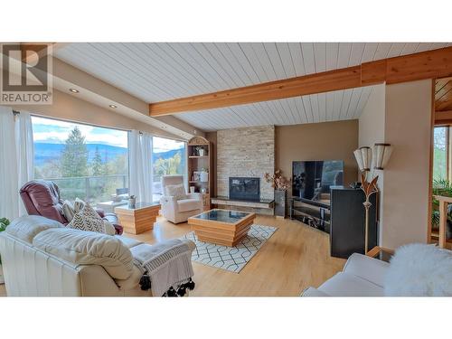 404 West Bench Drive, Penticton, BC - Indoor Photo Showing Living Room With Fireplace