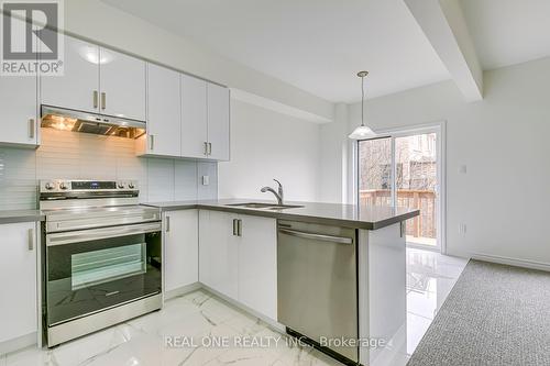 #56 -305 Garner Rd W, Hamilton, ON - Indoor Photo Showing Kitchen With Upgraded Kitchen