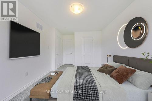 56 - 305 Garner Road W, Hamilton, ON - Indoor Photo Showing Bedroom