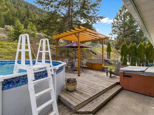 2749 Qu'Appelle Blvd, Kamloops, BC - Outdoor With Above Ground Pool With Deck Patio Veranda