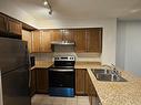 1202-335 Rathburn Rd W, Mississauga, ON  - Indoor Photo Showing Kitchen With Double Sink 