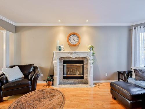 Salon - 2 Rue Des Liards, Blainville, QC - Indoor Photo Showing Living Room With Fireplace
