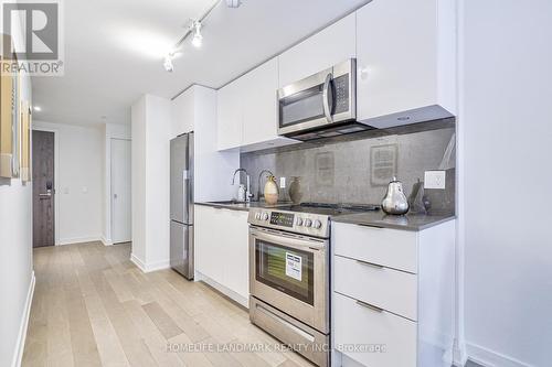 #310 -25 Richmond St E, Toronto, ON - Indoor Photo Showing Kitchen With Stainless Steel Kitchen With Upgraded Kitchen