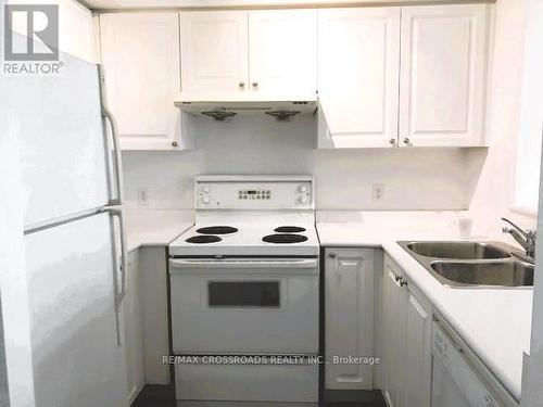 #Ph305 -11 Lee Centre Dr, Toronto, ON - Indoor Photo Showing Kitchen With Double Sink