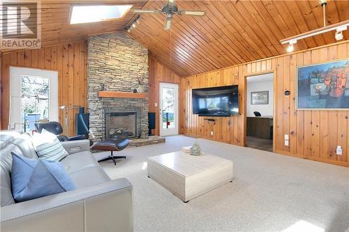 15953 Sunset Drive, Long Sault, ON - Indoor Photo Showing Living Room With Fireplace