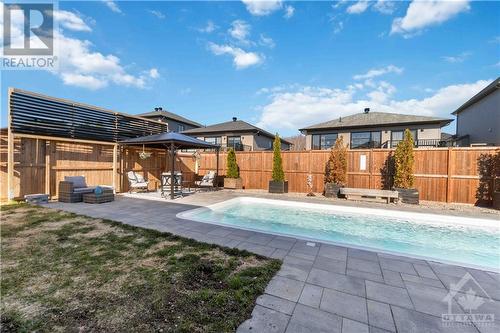 313 Nature Street, Casselman, ON - Outdoor With In Ground Pool