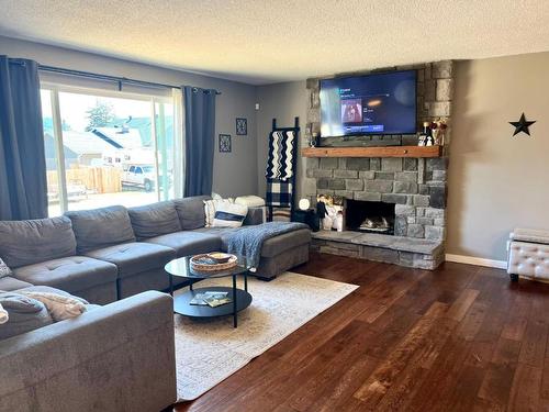 482 Palmer Street, Princeton, BC - Indoor Photo Showing Living Room With Fireplace