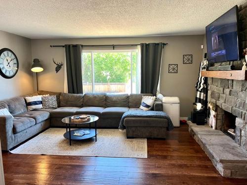 482 Palmer Street, Princeton, BC - Indoor Photo Showing Living Room With Fireplace