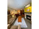 313 - 2060 Summit Drive, Panorama, BC  - Indoor Photo Showing Living Room With Fireplace 