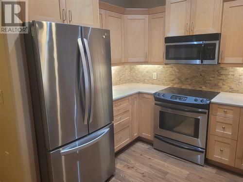 9100 Mackie Drive Unit# 114, Coldstream, BC - Indoor Photo Showing Kitchen With Upgraded Kitchen