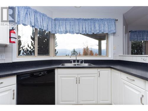 4074 Gellatly Road Unit# 233, West Kelowna, BC - Indoor Photo Showing Kitchen With Double Sink