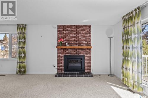 2589 15Th Avenue E, Prince Albert, SK - Indoor Photo Showing Living Room With Fireplace