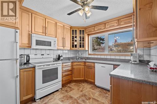 2589 15Th Avenue E, Prince Albert, SK - Indoor Photo Showing Kitchen With Double Sink