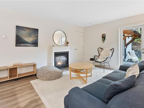 1-1782 St. Jacques Blvd, Ucluelet, BC - Indoor Photo Showing Living Room With Fireplace