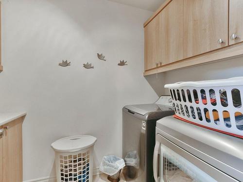 Bathroom - 83A  - 83C Rue Notre-Dame, L'Épiphanie, QC - Indoor Photo Showing Laundry Room